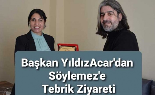 BAŞKANI YILDIZ ACAR’DAN TANER SÖYLEMEZ'E PLAKET